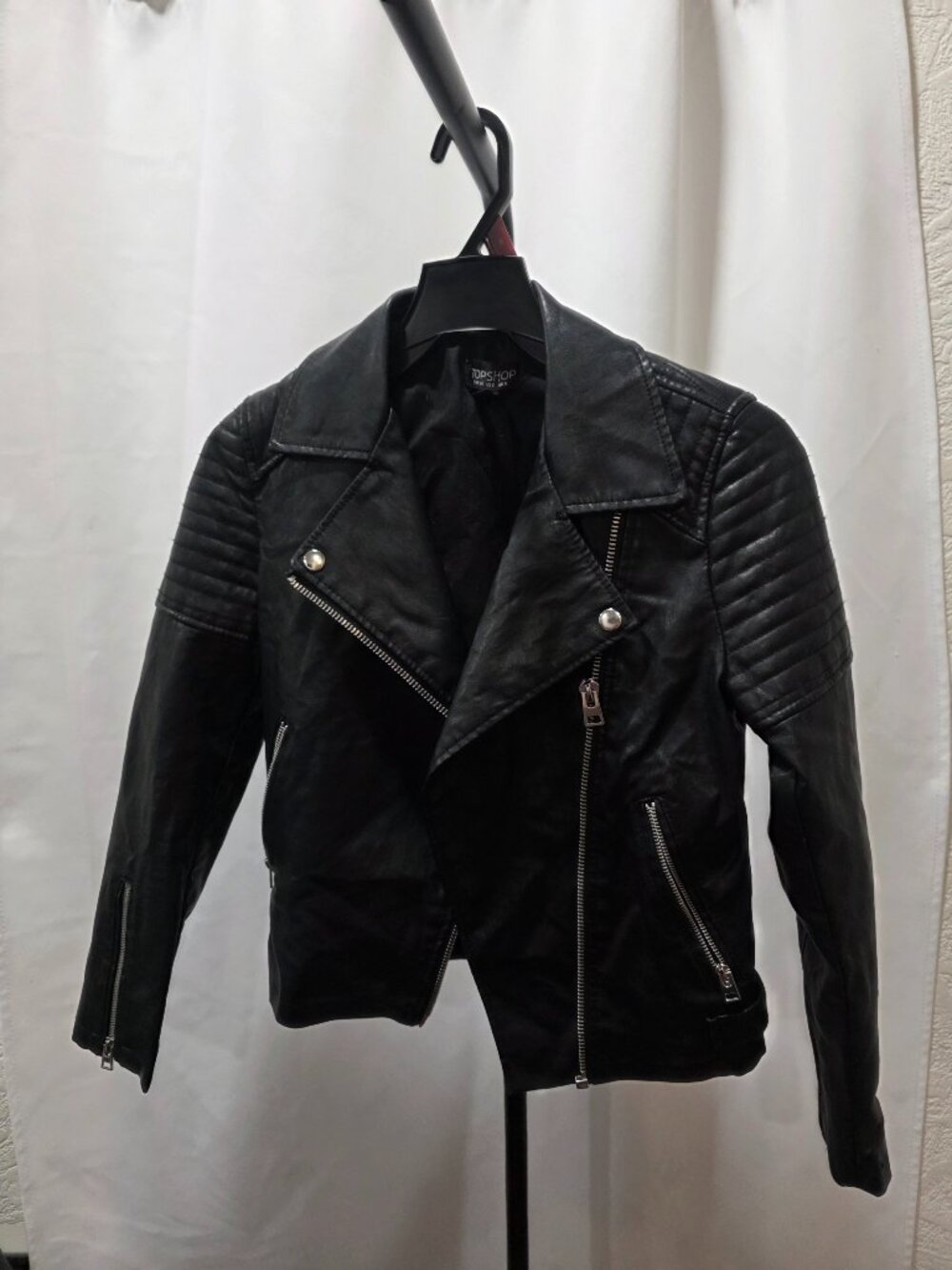 Black faux leather motorcycle style jacket